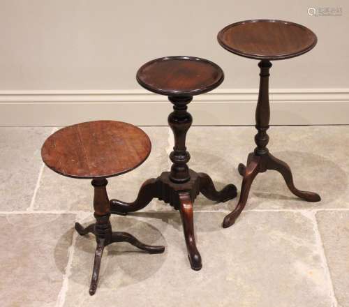 A 19th century mahogany wine table, the circular top with a ...