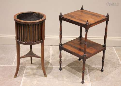 A 19th century rosewood two tier what not, raised upon slend...