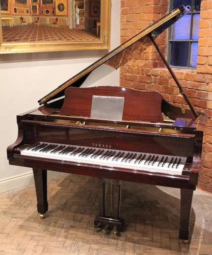 * A Yamaha G1 baby grand piano, registration number F5140649...