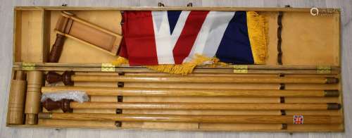 A bespoke cased sectional flagpole with Union Jack flag and ...