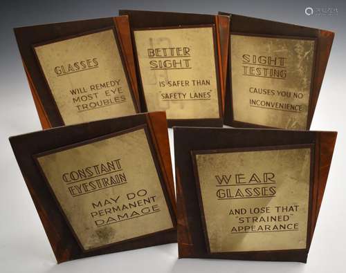 Set of five vintage opticians shop display advertising board...