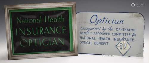 Two vintage opticians shop display signs, one National Healt...