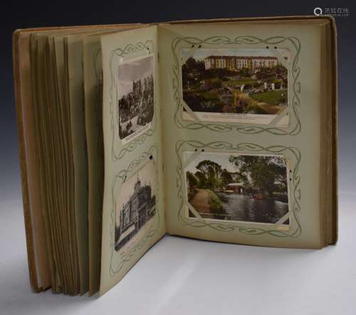 Vintage postcard album containing over 100 topographical pos...