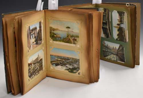 Over 325 postcards contained in two Edwardian albums includi...