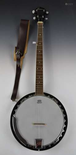 Encore five string banjo with leather shoulder strap