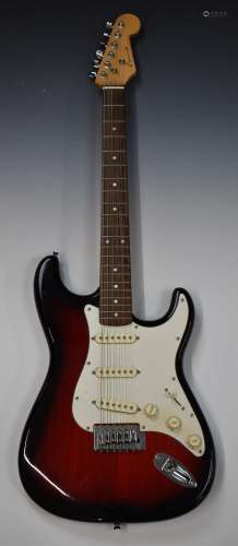 Conrad electric guitar in the style of a Fender Stratocaster