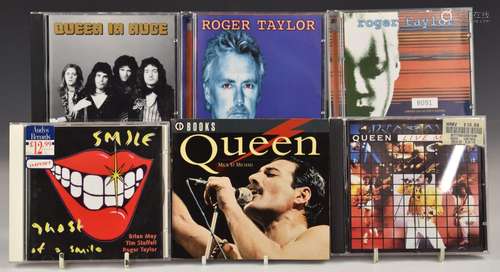 Queen - A collection of DVDs, CDs, VHS tapes and cassettes