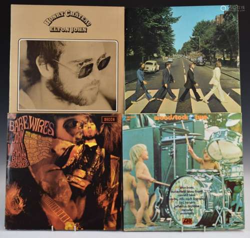 A collection of 23 albums including John Mayall, Queen, The ...