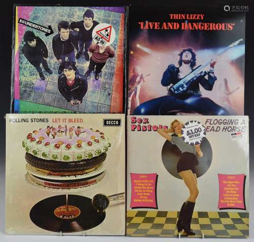 Approximately 60 albums including The Stranglers, Queen, U2,...