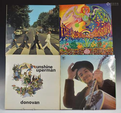 Approximately 40 albums including Bob Dylan, The Beatles, Do...