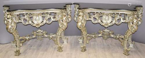 Pair of royalcore style silver coloured shaped console table...