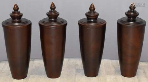 Four turned hardwood covered urns, H60cm