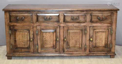 Antique style oaksideboard, fitted four drawers over four cu...