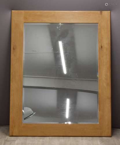 A contemporary oak bevelled glass mirror, 150 x 120cm