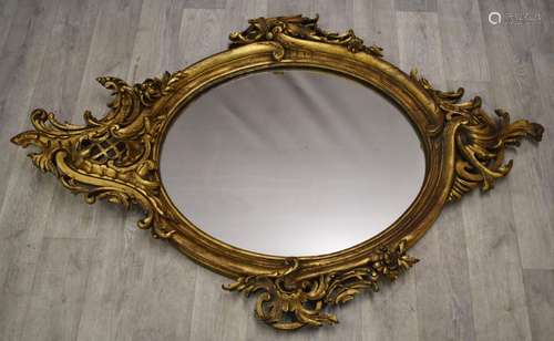 19th/20thC royalcore gilt framed mirror with flower and swag...