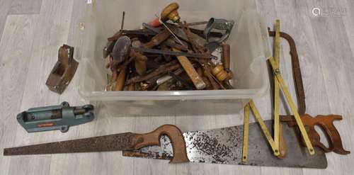 Vintage woodworking tools including saws, plane etc