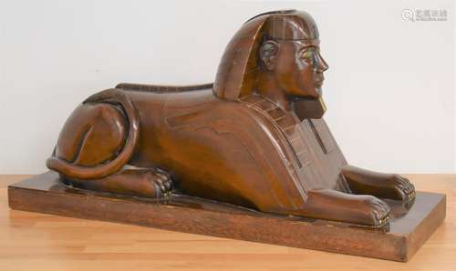 Art Deco Egyptian Revival brass inlaid mahogany sphinx, the ...