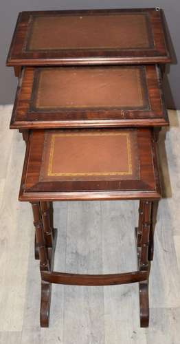 Nest of leather inset tables, W53 x D37 x H60cm