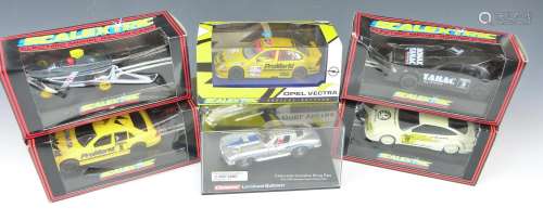Six Scalextric and Carrera 1:32 scale model motor racing car...