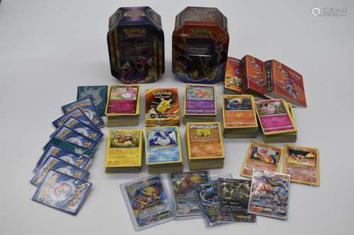 Over 800 Pokemon cards from a variety of decks including Sun...