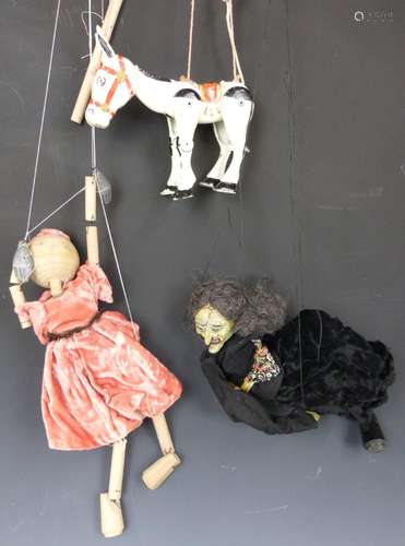 Three marionette puppets including Muffin the Mule.