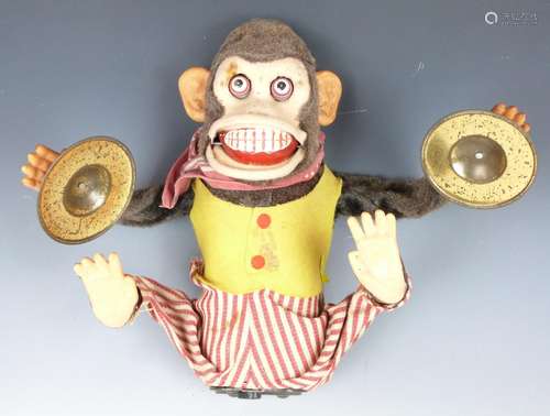 Japanese battery operated tinplate and felt model monkey pla...