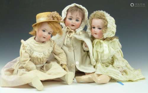 Three Armand Marseille and similar bisque headed dolls, one ...