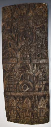 African carved tribal panel depicting masks, 82 x 31cm