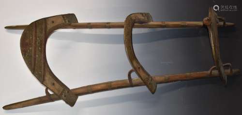 A 19th/20thC wooden dromedarycamel saddle with engraved bras...