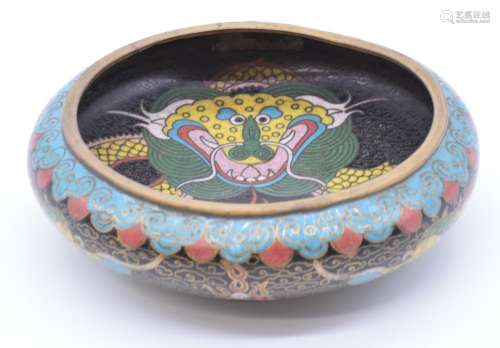Chinese cloisonne enamel dish depicting a dragon chasing a f...