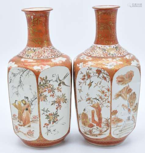 A pair of Japanese Kutani octagonal bottle vases, the panels...