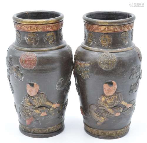 A pair of early 20thC Chinese relief moulded vases, H25.5cm