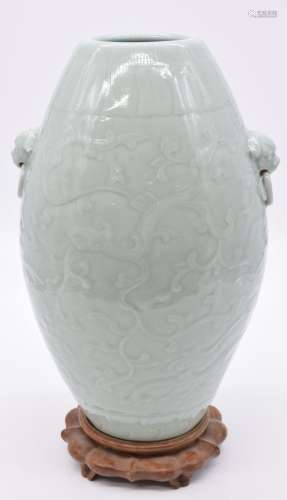 Chinese celadon vase with moulded decoration and stylised ri...