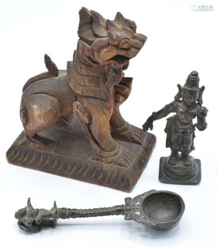 Two Burmese bronzes, one a spoon the other a female warrior,...