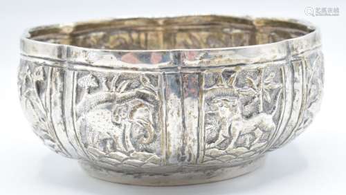 Indian or Burmese silver bowl with lobed embossed decoration...