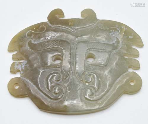 Chinese 19thCjade archaic pendant depicting a stylised Fu do...