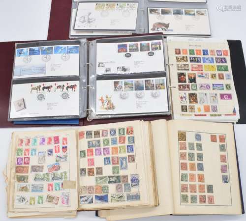 Three albums of world stamps including GB and two albums of ...