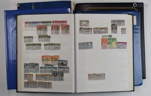 A collection of mint and used GB Commonwealth stamps in six ...