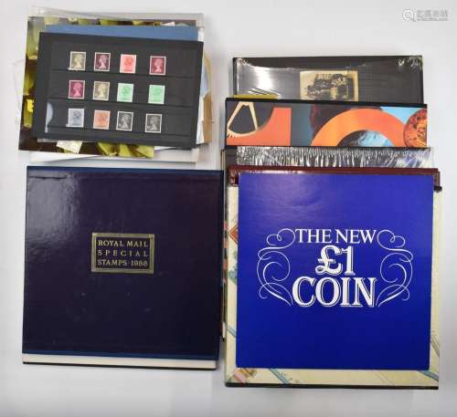 A collection of GB yearbooks and mint postage stamps, presti...