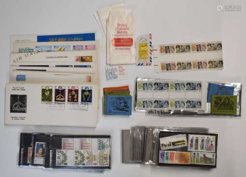 A quantity of mint GB stamps on stockcards, booklets, Bahrai...