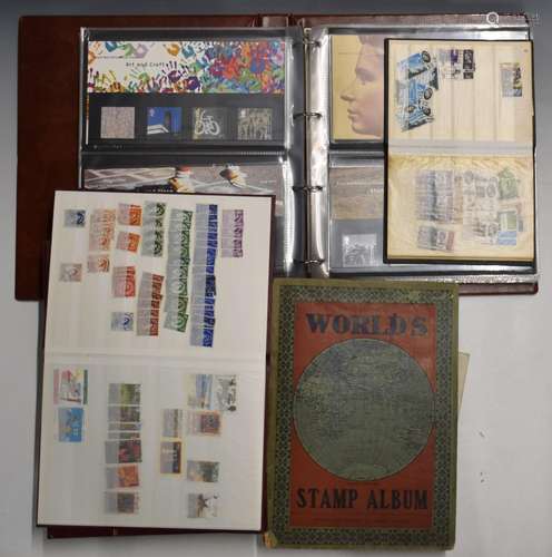 An album of GB presentation packs, two empty stockbooks, thr...