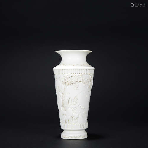 A white glazed 'landscape' vase