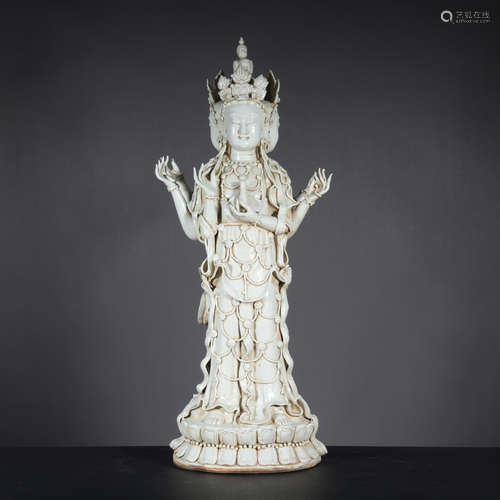 A celadon-glazed statue of Guanyin