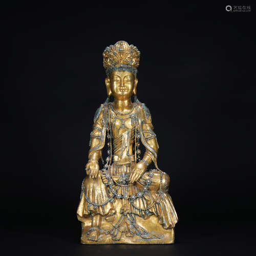 A gilt-bronze statue of Sakyamumi