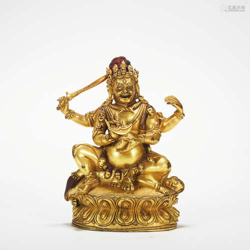 A gilt-bronze statue of Mammon