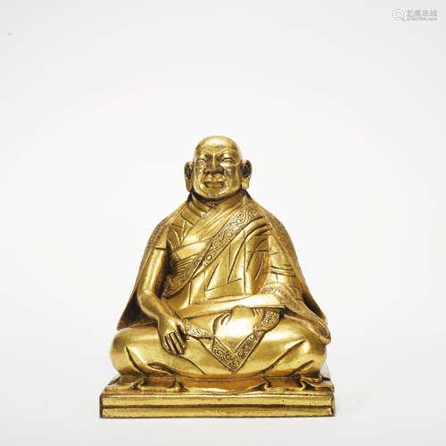 A gilt-bronze statue of guru