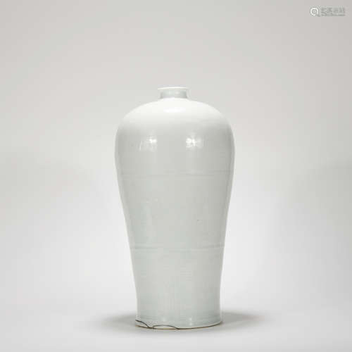 A white glazed vase