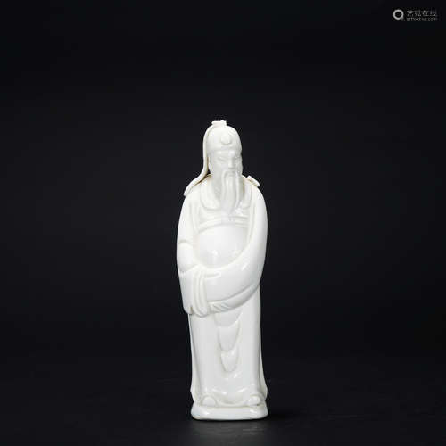 A white glazed figure