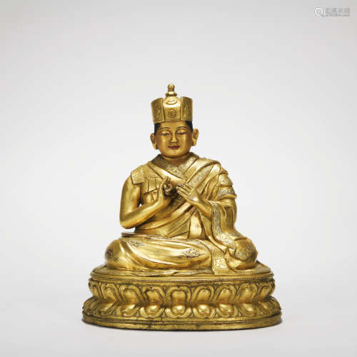 A gilt-bronze statue of guru