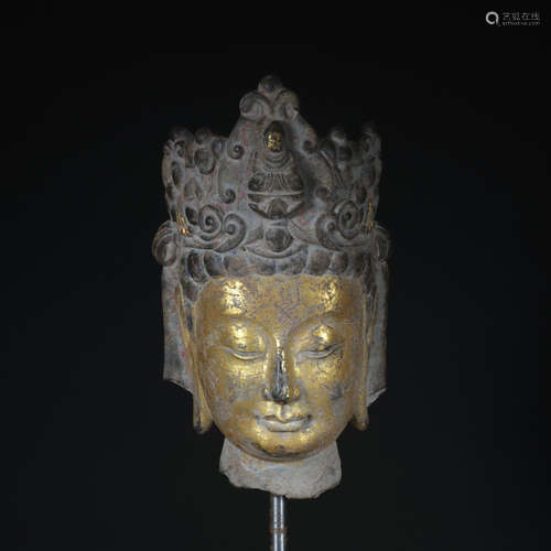 A gilt-bronze buddha head